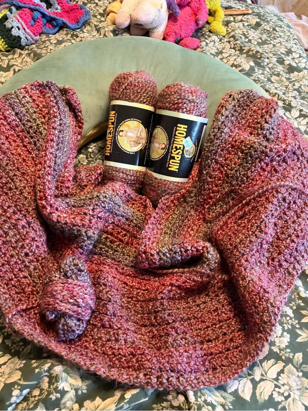 Homespun Variegated Pink Lavender Crochet Throw with Yarn bundle in Great Plains